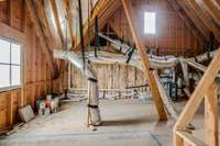 A picture of the floored attic space with closet space marked off.