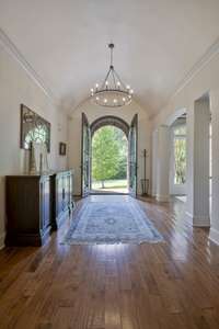 Nothing small about this entrance...let the friends gather!  Barrel roll ceiling adds extra design element