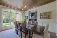 Full eat in dining room with built in cabinetry.