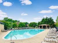 Fantastic neighborhood pool and lots of decking for everyone to have space to enjoy this summer!