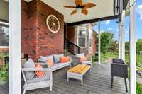 Fabulous covered deck with ceiling fan, and updated with composite wood