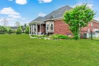 Wonderful level backyard with covered deck to enjoy!