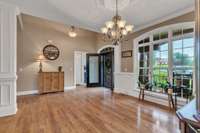 Formal dining room and foyer.  Dining room currently empty without table and chairs (seller getting ready to move!)