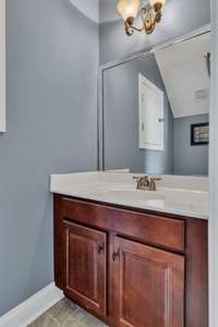 Guest half bathroom located off the bonus room. . .  great for all your guests to use when entertaining.