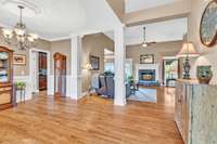 View from foyer with formal dining room to the left.  Beautiful trim work throughout the home.