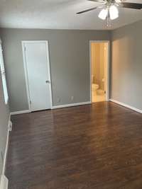 Master bedroom with walk-in closet and bathroom