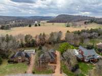 This is a good shot of the undeveloped land behind the house which makes it feel expansive and open.