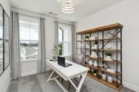 Guest bedroom downstairs shown as study.