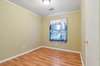 Bedroom number one features hardwood floors.