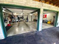 Two care garage has clean concrete and ready for your vehicles!