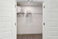 Large walk-in closet off of 3rd bedroom upstairs.