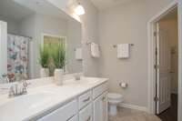 Double vanities and a garden tub make this a delightful bathroom.