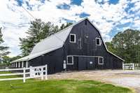 The horse barn is such a statement!   Space for horses or lots of storage.....you choose!