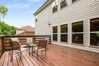 Opens up to a deck - perfect for summer time! Total of 500 sq ft of entertaining space