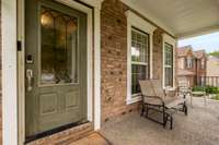 Such an inviting front porch!  Drink your coffee or tea on the front covered area