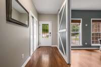 Dining room was converted into a home office with the barn door.