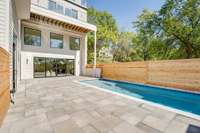 Pool patio area is pre-plumbed with gas and electric for an outdoor kitchen.