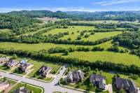 This is the 100 acre farmland behind the house.  Home is to the right of the dead end street in the middle of the photo.