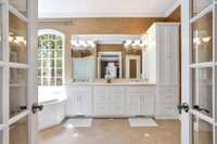 Large master bathroom with his and her sinks. Lots of storage