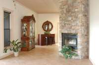 Lower Level Living Room with recessed lighting and ceiling fan. Million Dollar views. 6yr rental history upper level year round.