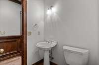 Experience the ultimate convenience with the powder room situated just off the family room and office.