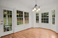 The Breakfast Nook offers a cozy spot with a view, overlooking the back yard.