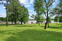 Huge yard with gentle slope to the covered dock and lake