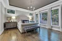 Primary Suite with gorgeous large windows flooding the space with natural light.