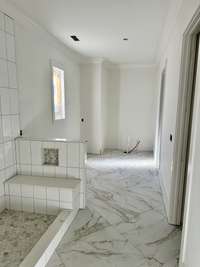 Primary Bath with beautiful 32x32 tile