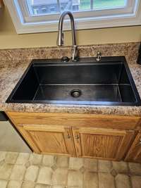 New large sink in kitchen.