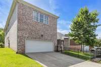 2-car garage is accessible behind the home