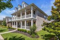 2-story porches with ceiling fans and porch swings