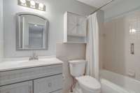 Full updated secondary bath w/ newer vanity & hardware, faucet & mirror