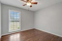 Second of three bedrooms w/ new ceiling fan