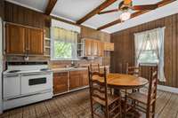 kitchen has wood ceiling beams