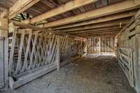 livestock barn with built in hay racks and loft