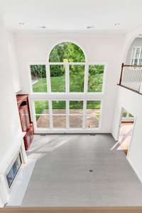 Looking down from the upstairs into the family room.