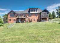 The back of the house and tons of backyard space.