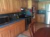 Spacious kitchen with plenty of cabinets. Almost new stove