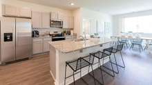 Kitchen and Bath will have Quartz countertops. Fridge not included.