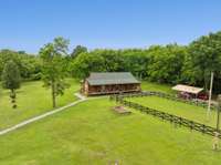 Home and training ring #1, storm shelter, and RV connections