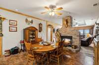 Breakfast nook back to living room.  Owner's suite and utility on left