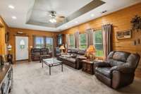 Living Room, white door exits to covered front porch