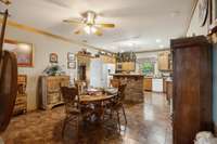 Breakfast nook looking into kitchen.  Dinning Room on Left