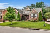 Front of home situation on a beautiful lot that backs up to woods for privacy