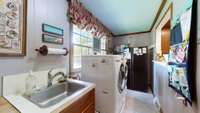 Huge laundry room with extra large pantry