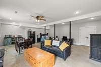 A basement studio apartment, flex space, or great space for a recreational room.