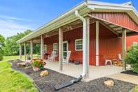 Barndominium front covered porch.