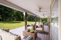 Virtually staged. Large, covered back deck with ceiling fans!