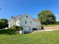 2 garage doors located at the end of house allows easy access and storage